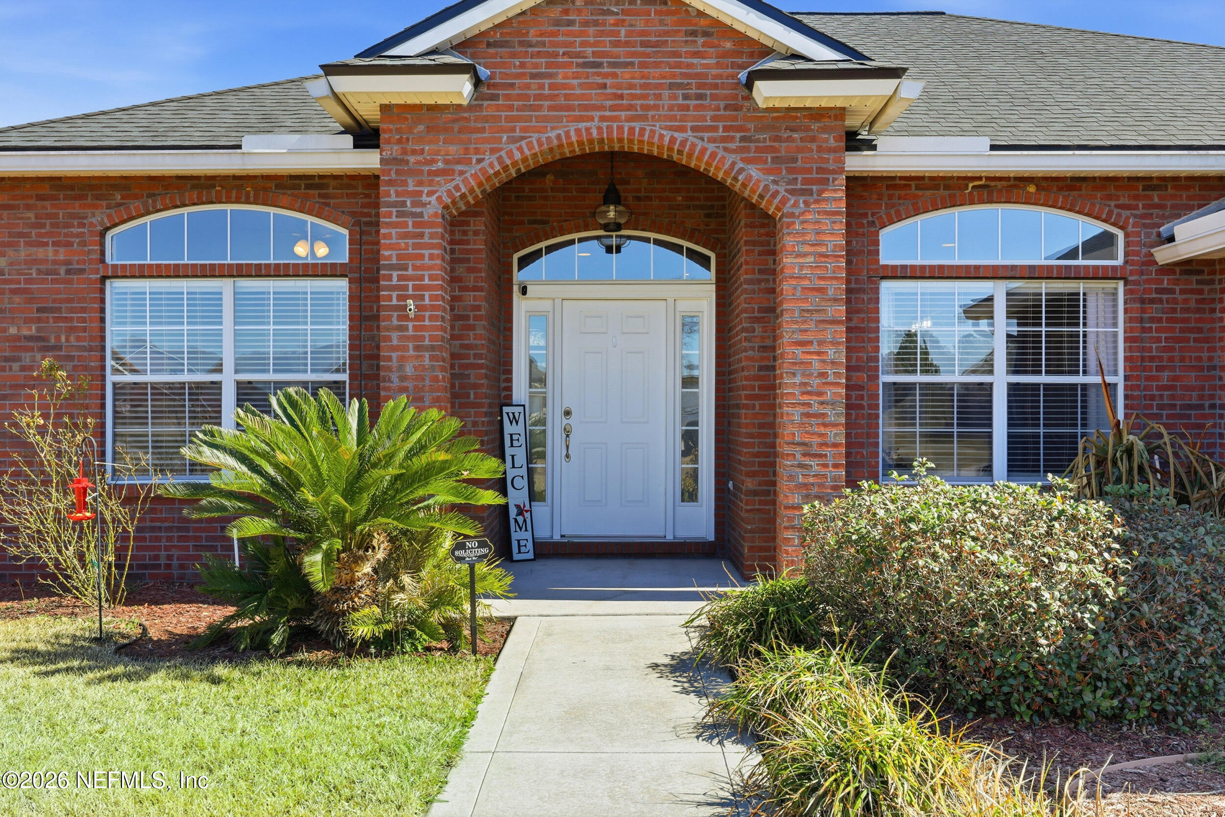 44808 Green Meadows Lane Callahan, FL 32011 - Photo 40 of 41 a front view of a house with garden