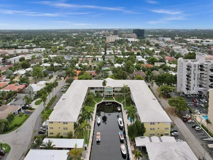an aerial view of a house with a garden