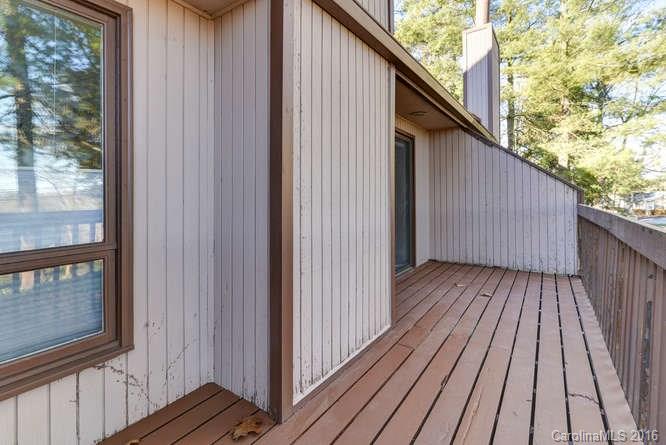 79 Maple Ridge Lane, Unit 79 Asheville, NC 28806 - Photo 17 of 20 a view of wooden balcony