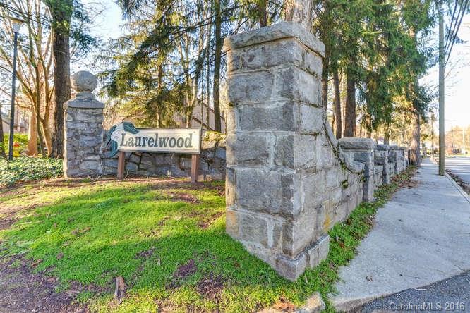 79 Maple Ridge Lane, Unit 79 Asheville, NC 28806 - Photo 18 of 20 a sign board with yard in front of it