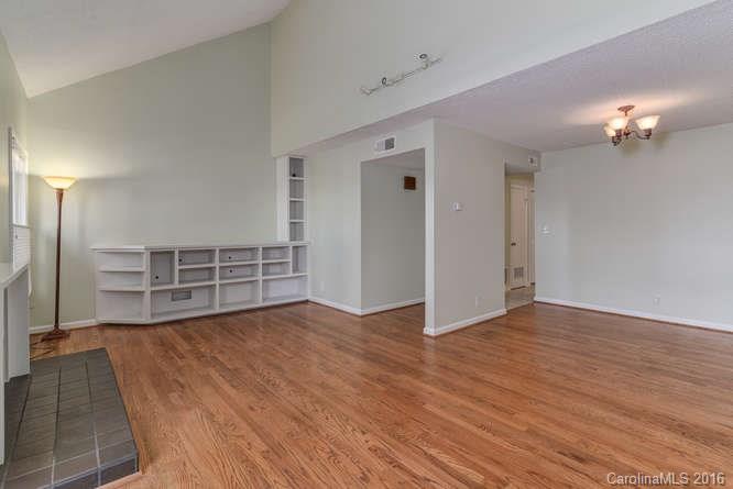79 Maple Ridge Lane, Unit 79 Asheville, NC 28806 - Photo 4 of 20 wooden floor in an empty room