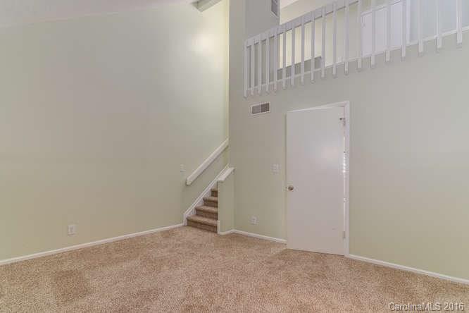 79 Maple Ridge Lane, Unit 79 Asheville, NC 28806 - Photo 9 of 20 an entryway with stairs and a window
