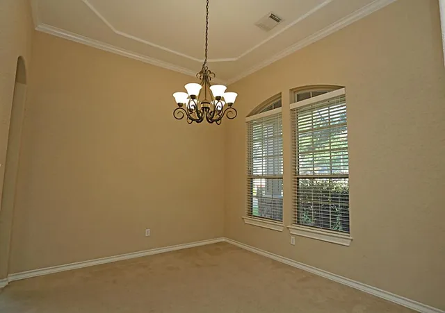 a view of a livingroom with a chandelier
