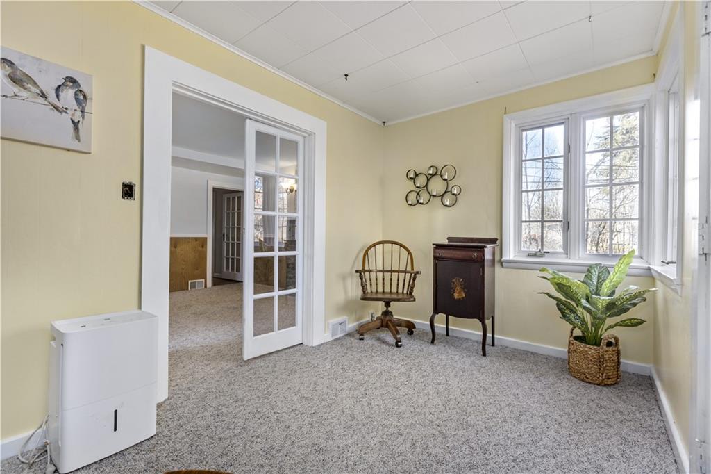 4267 Glen Eden Road Cranberry Township, PA 16066 - Photo 11 of 25 a view of a livingroom with furniture and a window