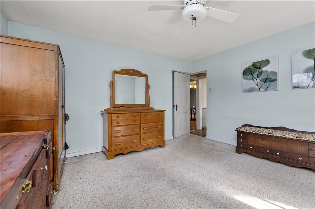 4267 Glen Eden Road Cranberry Township, PA 16066 - Photo 16 of 25 a living room with furniture and a dresser