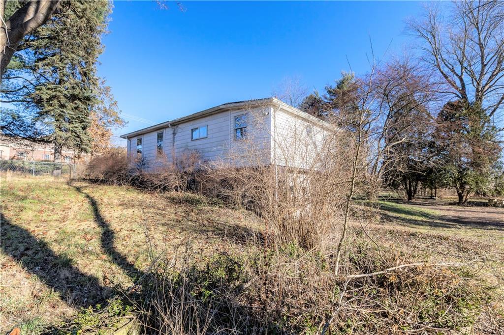 4267 Glen Eden Road Cranberry Township, PA 16066 - Photo 23 of 25 a view of a backyard of the house