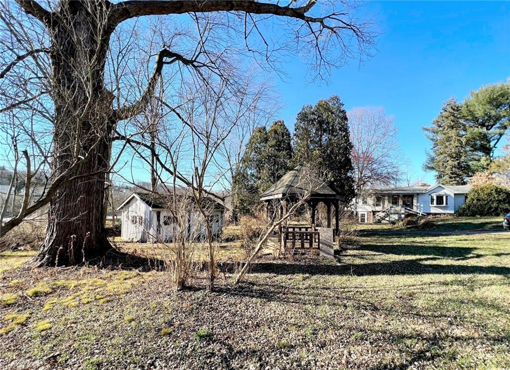 4267 Glen Eden Road Cranberry Township, PA 16066 - Photo 24 of 25 a view of a house with a yard