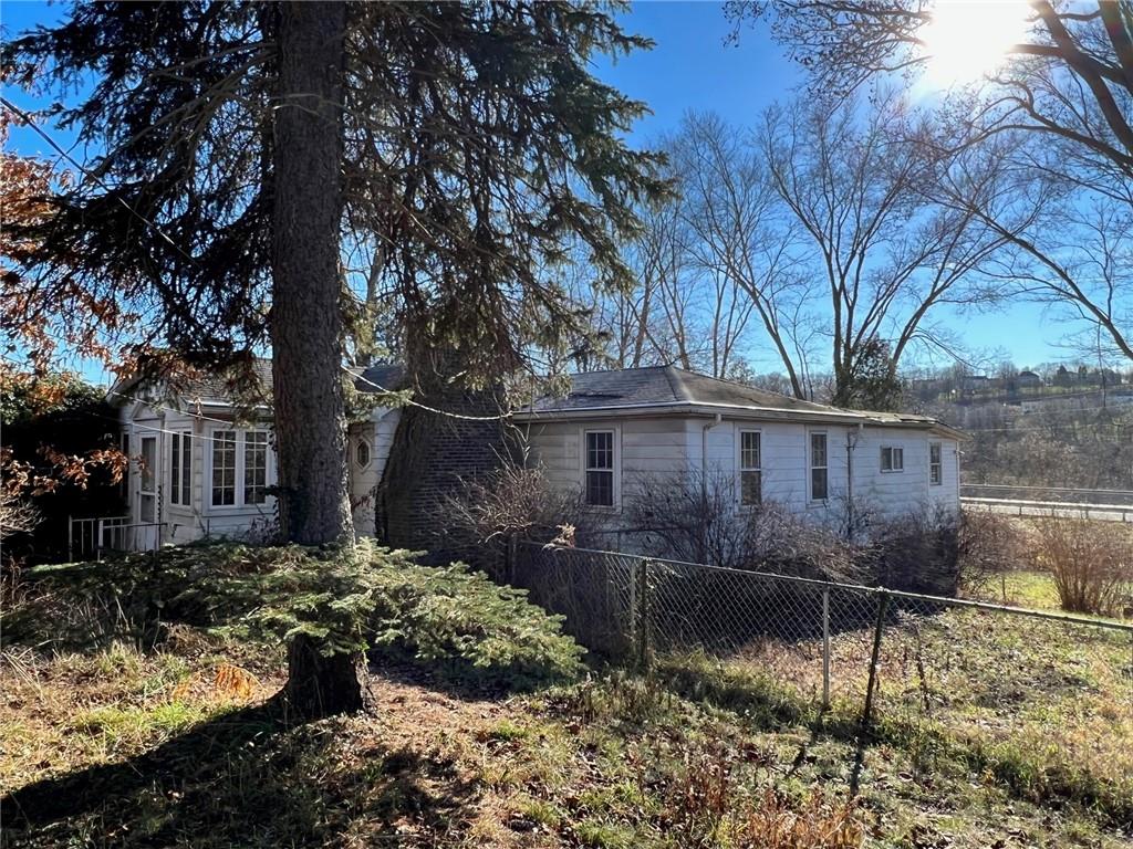 4267 Glen Eden Road Cranberry Township, PA 16066 - Photo 25 of 25 a view of a yard with a large tree
