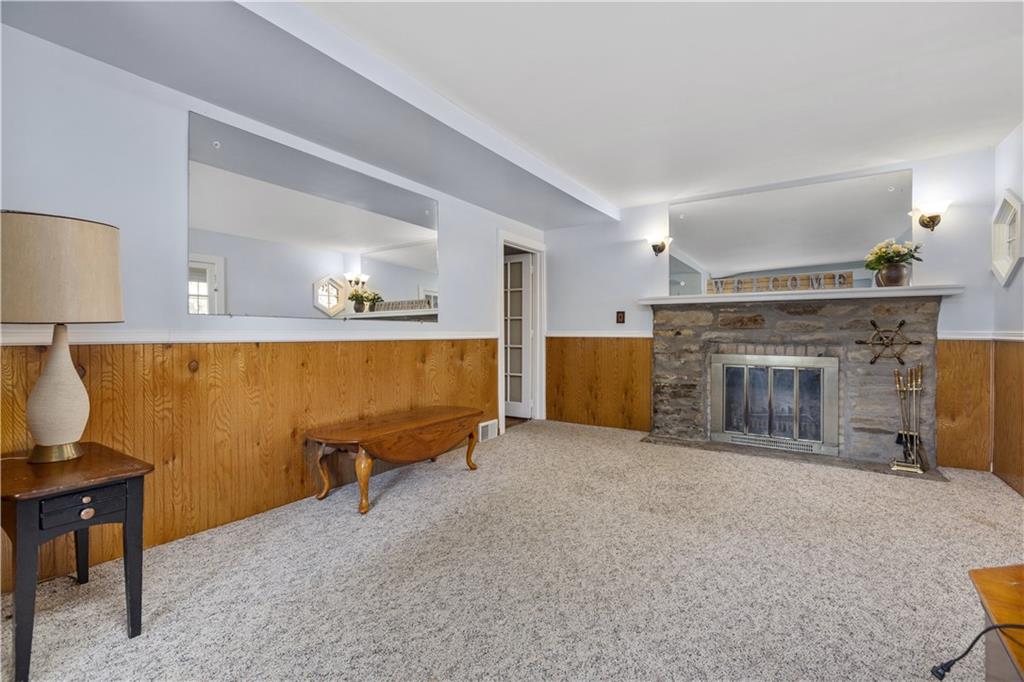 4267 Glen Eden Road Cranberry Township, PA 16066 - Photo 9 of 25 a view of a livingroom with furniture and a fireplace
