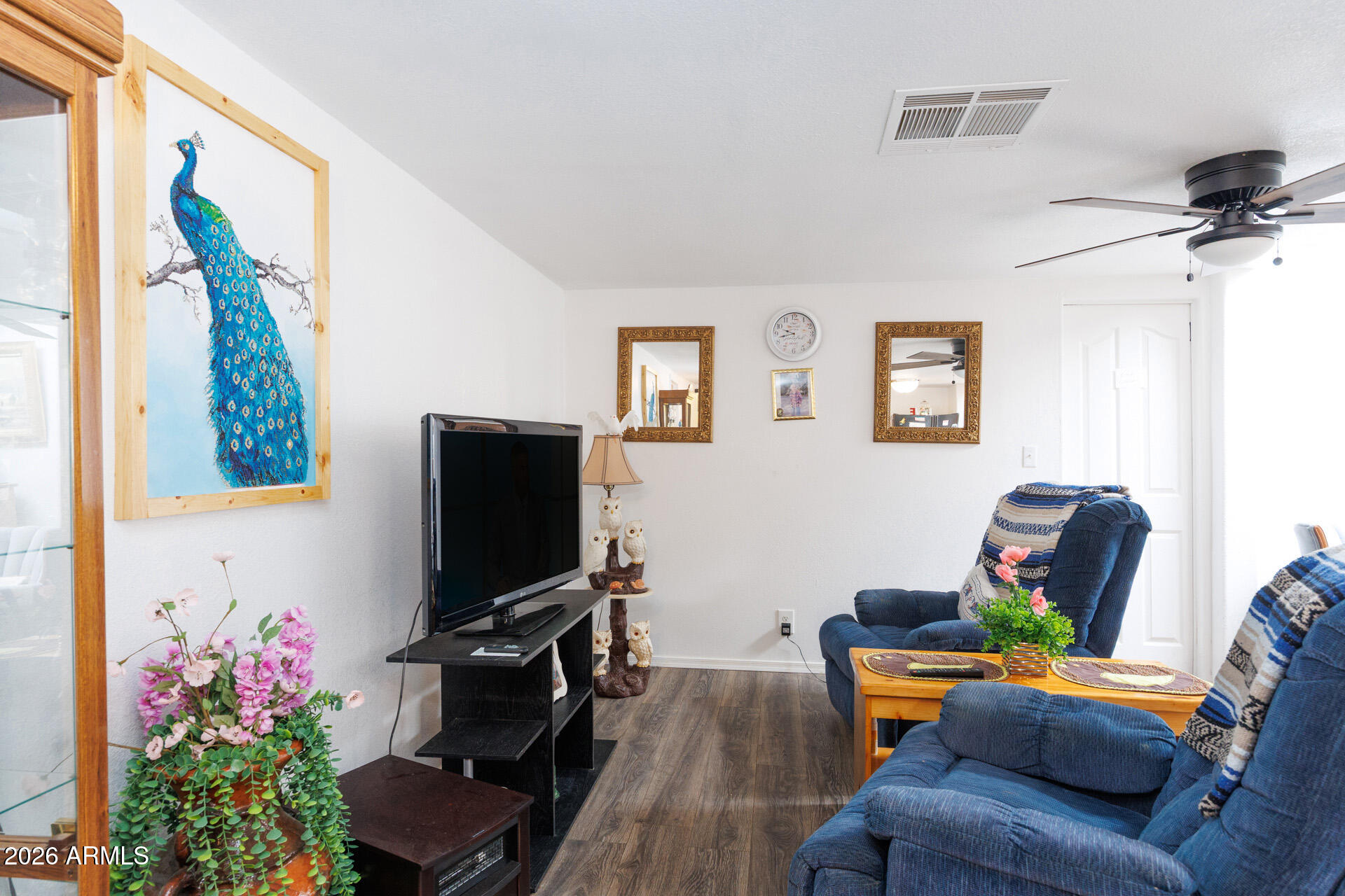 6185 East Monitor Street Picacho, AZ 85141 - Photo 21 of 55 a living room with furniture and a flat screen tv
