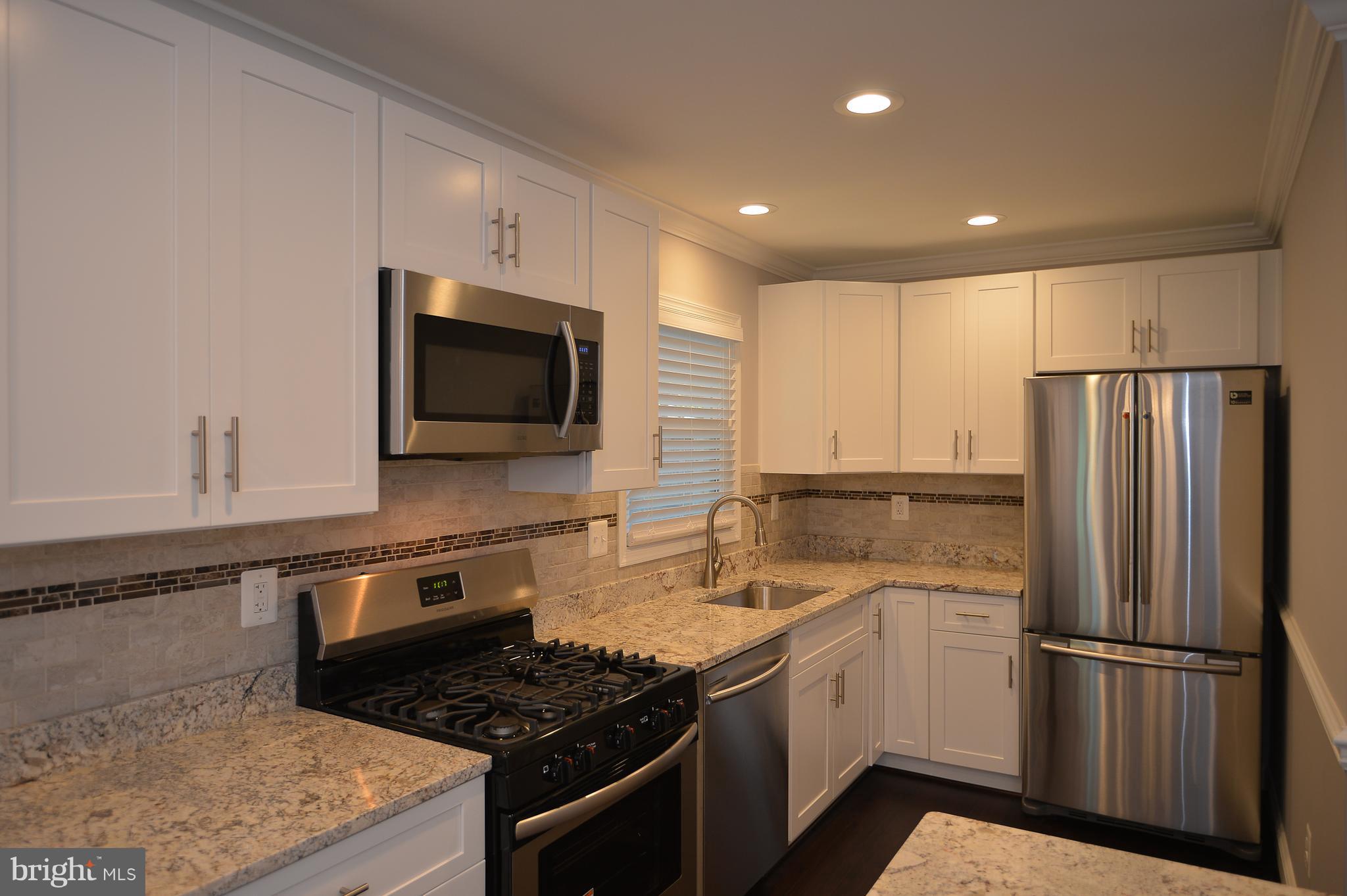 208 Acadia Road Waldorf, MD 20602 - Photo 7 of 29 Kitchen with brand new SS appliances and cabinets