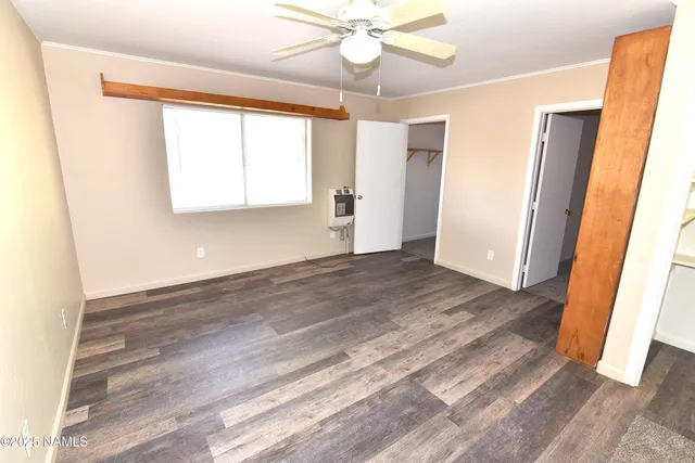 a view of a chairs in wooden roof deck