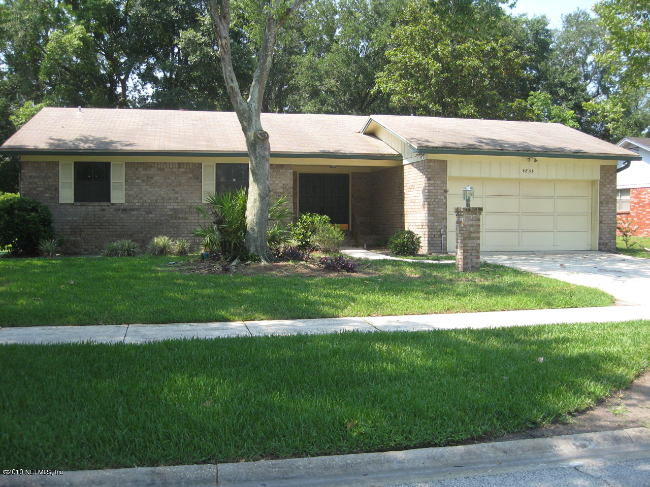 4854 Latimer Road South Jacksonville, FL 32257 - Photo 1 of 15 a front view of a house with a yard