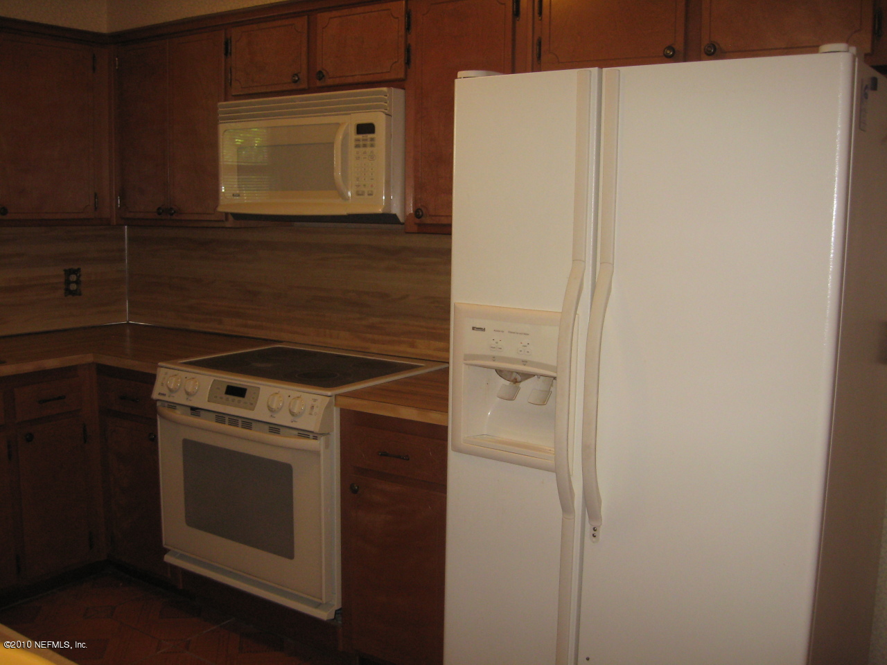 4854 Latimer Road South Jacksonville, FL 32257 - Photo 4 of 15 a stove top oven sitting inside of a kitchen