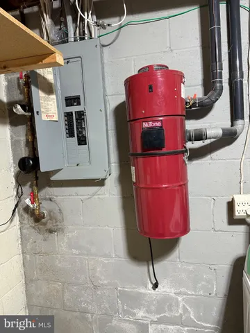 a kitchen with stainless steel appliances a stove a microwave and sink