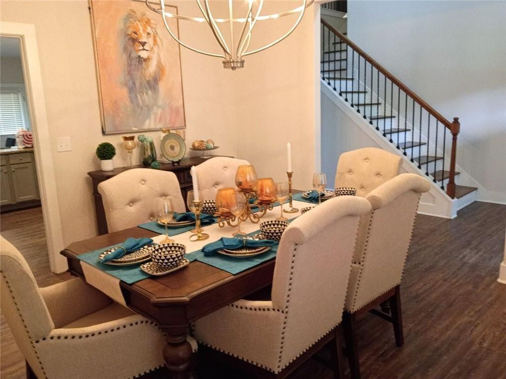 807 Ridgeview Court Hampton, GA 30228 - Photo 10 of 69 a dining room with furniture and wooden floor