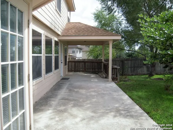 a view of backyard with green space