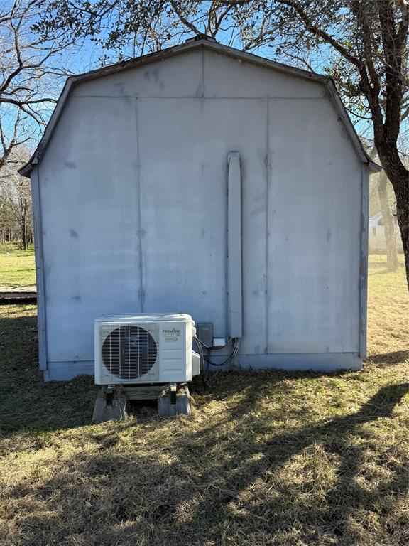 729 County Road 1304 Morgan, TX 76671 - Photo 12 of 32 a backyard of a house with yard and outdoor seating