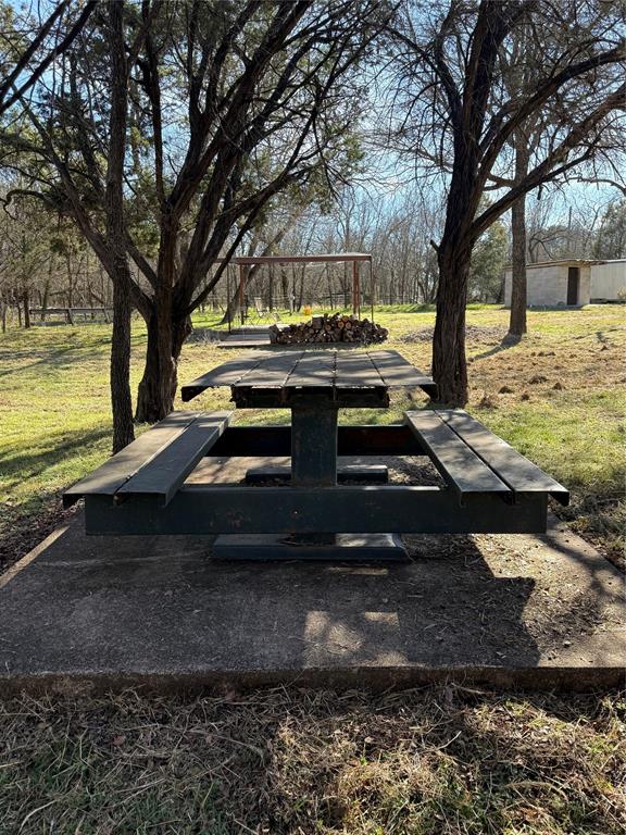 729 County Road 1304 Morgan, TX 76671 - Photo 19 of 32 a view of a yard with wooden fence