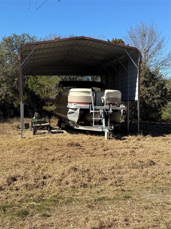 729 County Road 1304 Morgan, TX 76671 - Photo 20 of 32 a view of a car parked in the yard