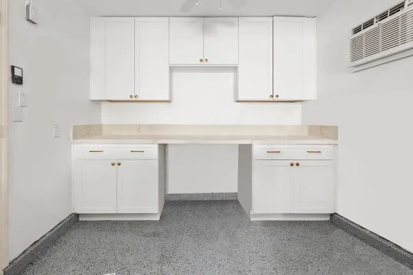a view of cabinets with wooden floor