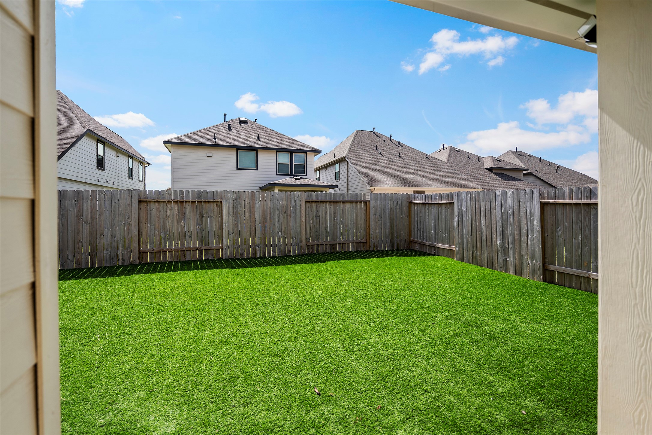 10423 Rochester Hls Lane Tomball, TX 77375 - Photo 27 of 32 Backyard; Turf Grass