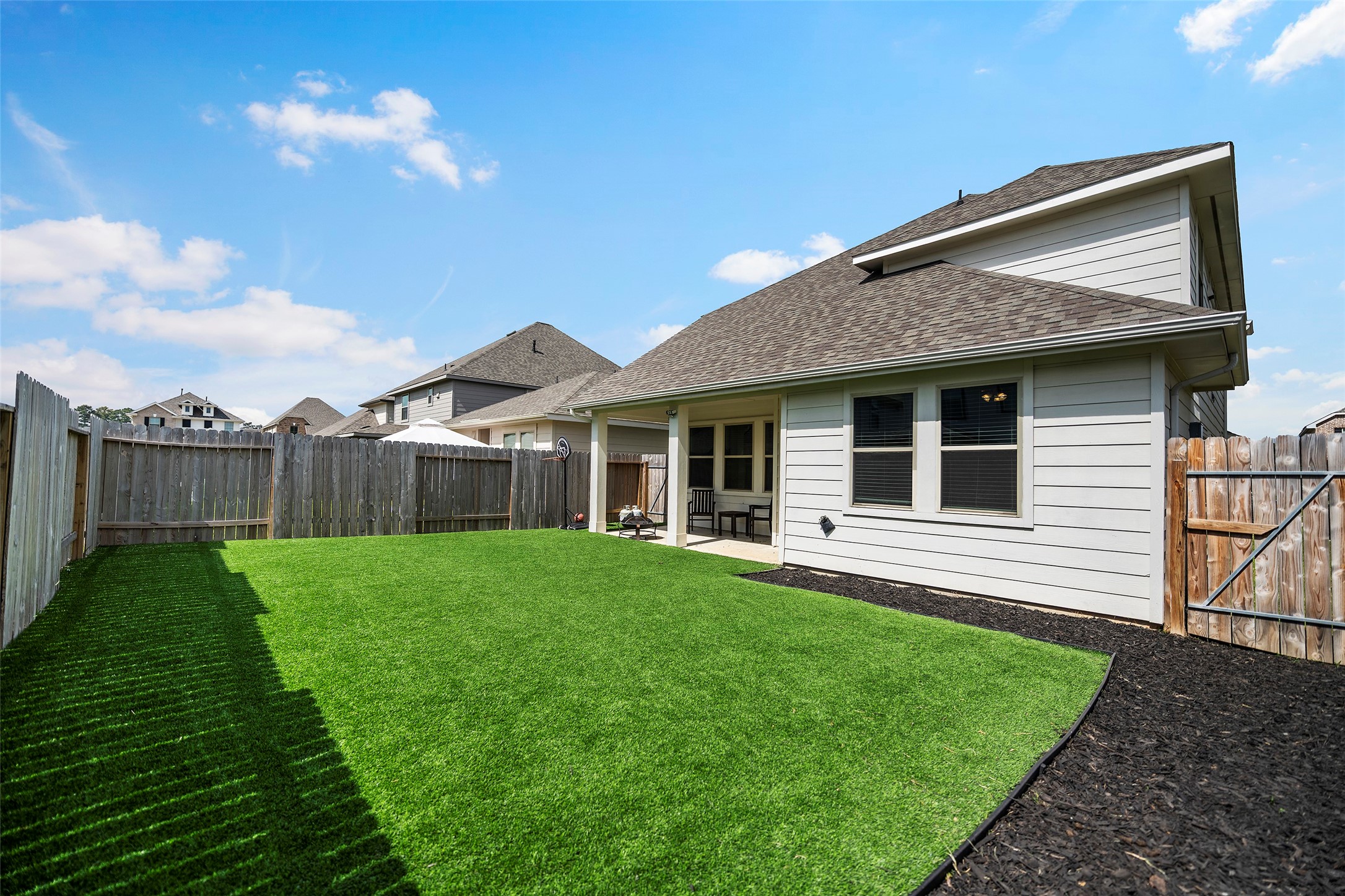 10423 Rochester Hls Lane Tomball, TX 77375 - Photo 28 of 32 Backyard; Turf Grass