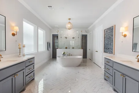 a bathroom with a bathtub and shower