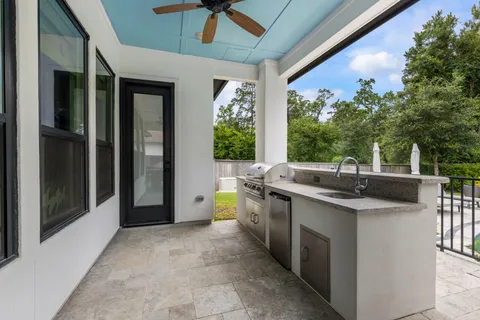a view of a swimming pool with a lounge chairs