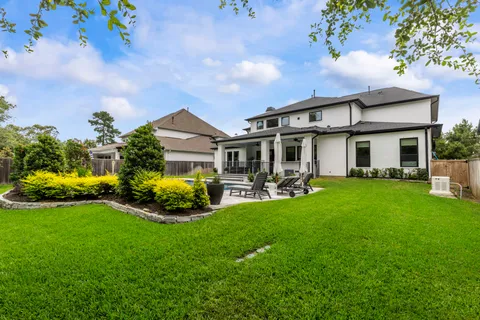 a view of a swimming pool with a lounge chairs