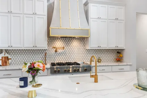 a kitchen with a sink and cabinets