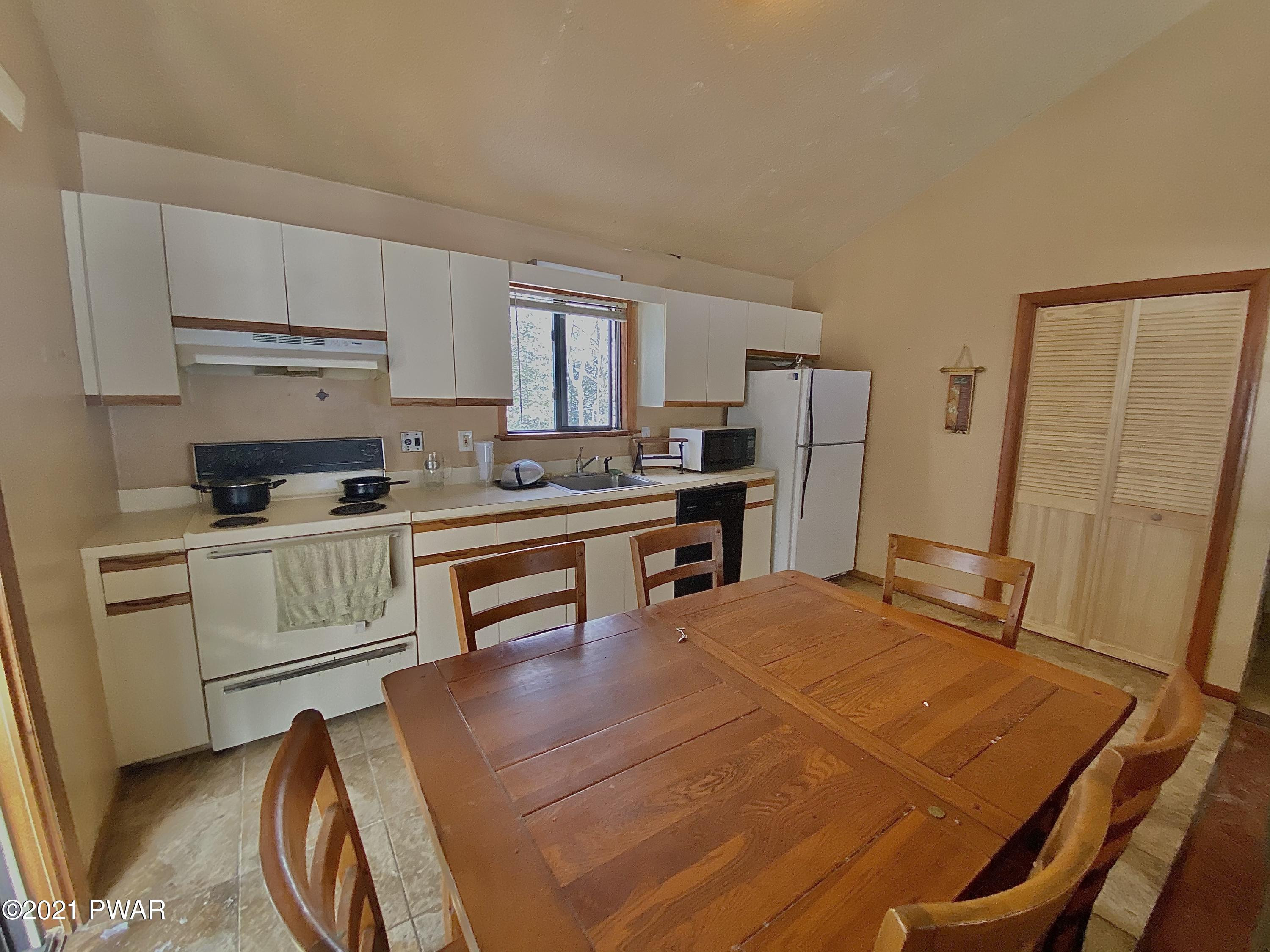 3104 Northgate Road Lake Ariel, PA 18436 - Photo 7 of 25 a kitchen with a sink appliances and cabinets