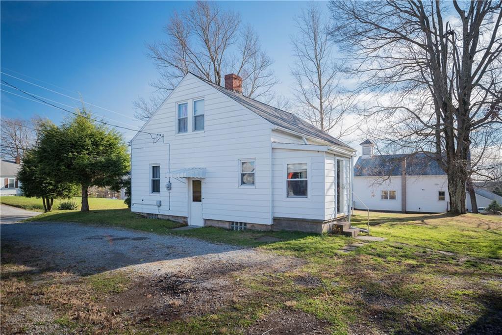 5412 Pittsburgh Road Barkeyville, PA 16038 - Photo 18 of 19 a view of a house with a yard