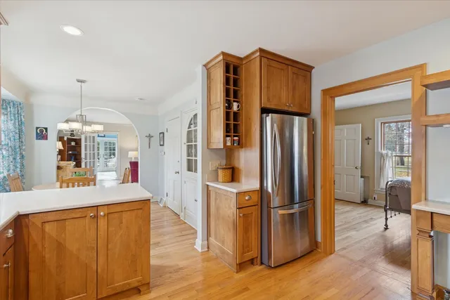 a kitchen with stainless steel appliances a stove a microwave and cabinets