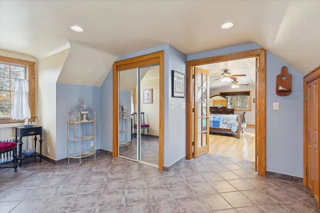 a view of a hallway with washer and dryer