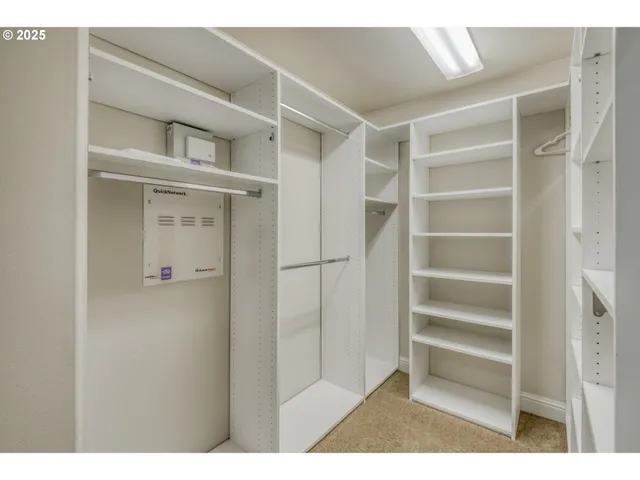 a bathroom with a sink double vanity and a mirror