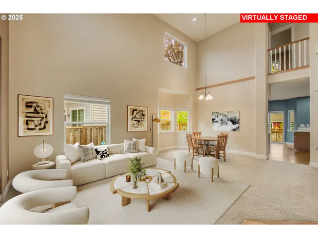 a living room with furniture and a table