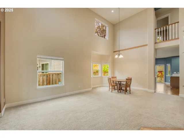 a view of livingroom with furniture and window