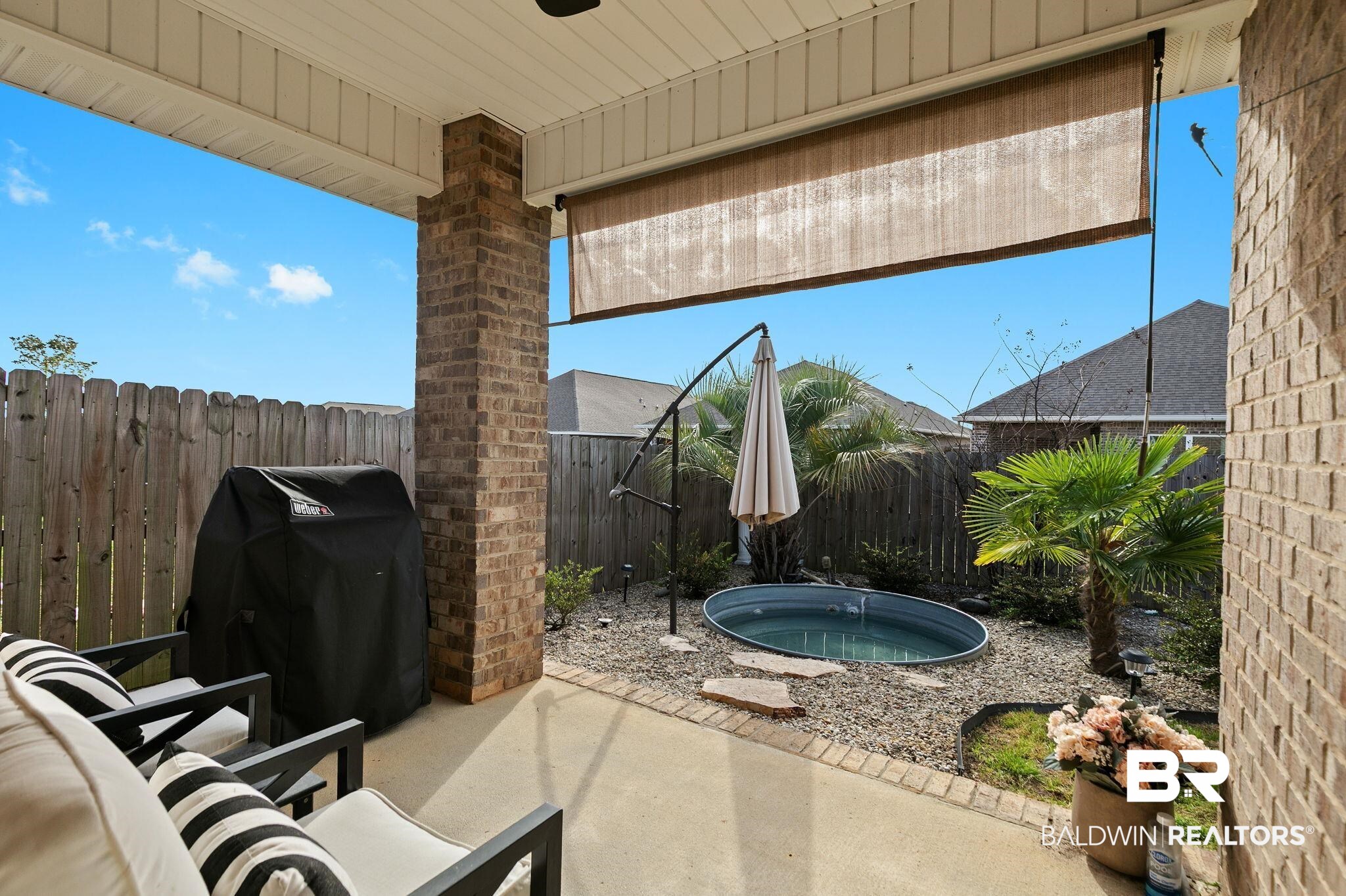 31650 Memphis Loop Daphne, AL 36527 - Photo 42 of 68 Fenced backyard featuring a patio area and area for grilling