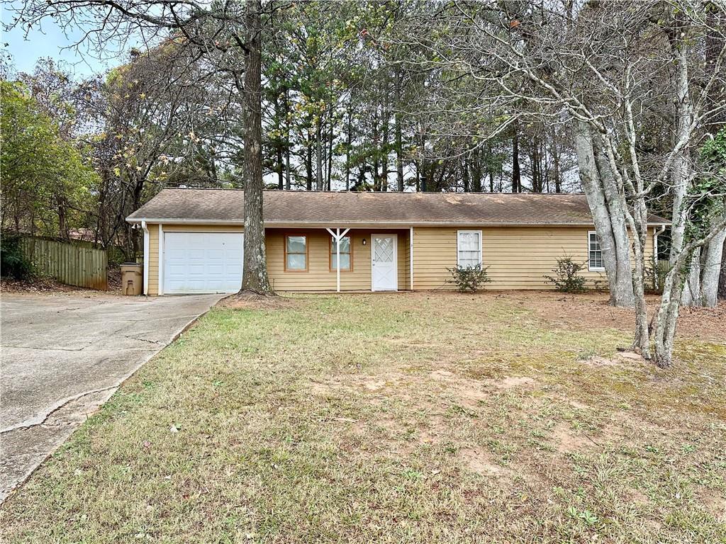 3261 Morgan Road Canton, GA 30115 - Photo 1 of 1 front view of a house with a yard