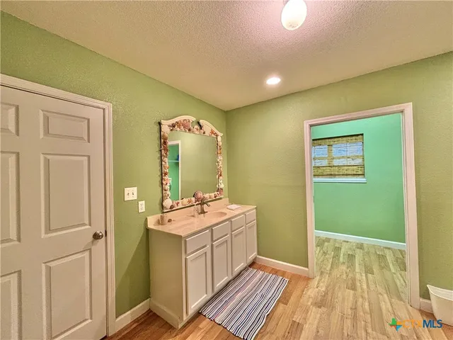 a hallway with washer and dryer