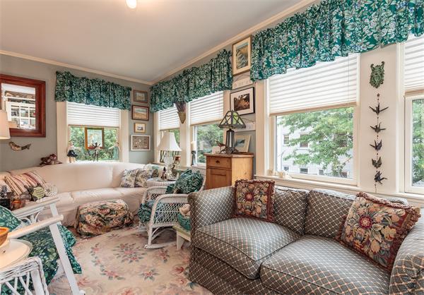 151 Appleton Street Cambridge, MA 02138 - Photo 4 of 15 a living room with furniture and a large window