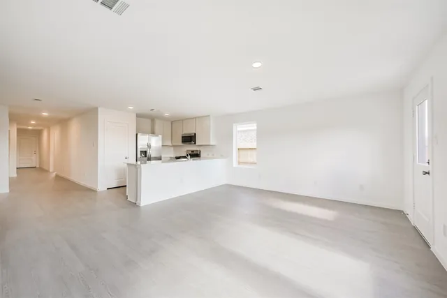 a view of kitchen and kitchen island