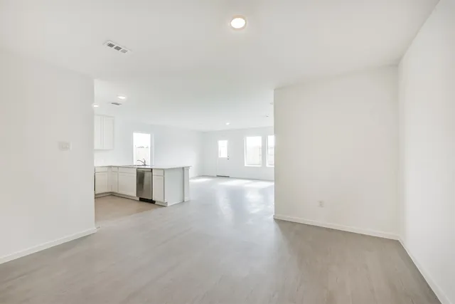 an empty room with windows