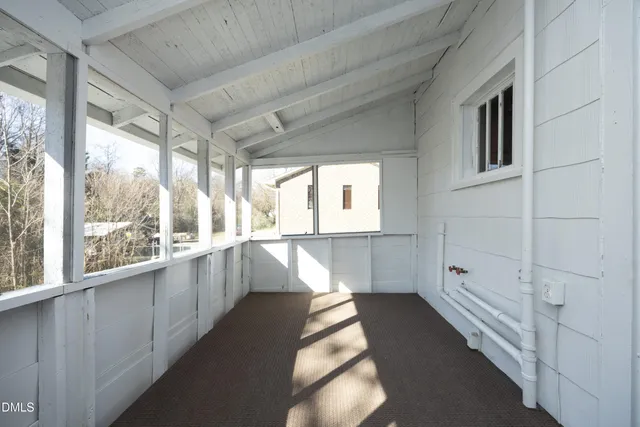 a view of a bathroom with a large window