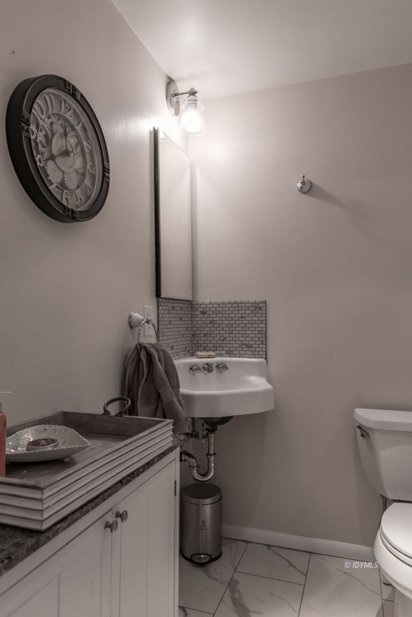 25650 Seneca Road Idyllwild, CA 92549 - Photo 12 of 23 a bathroom with a sink and a toilet
