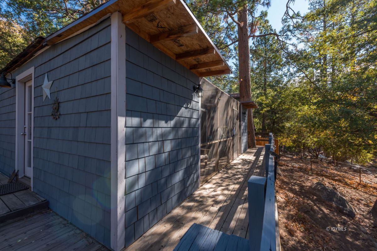 25650 Seneca Road Idyllwild, CA 92549 - Photo 18 of 23 a view of a house with a tree