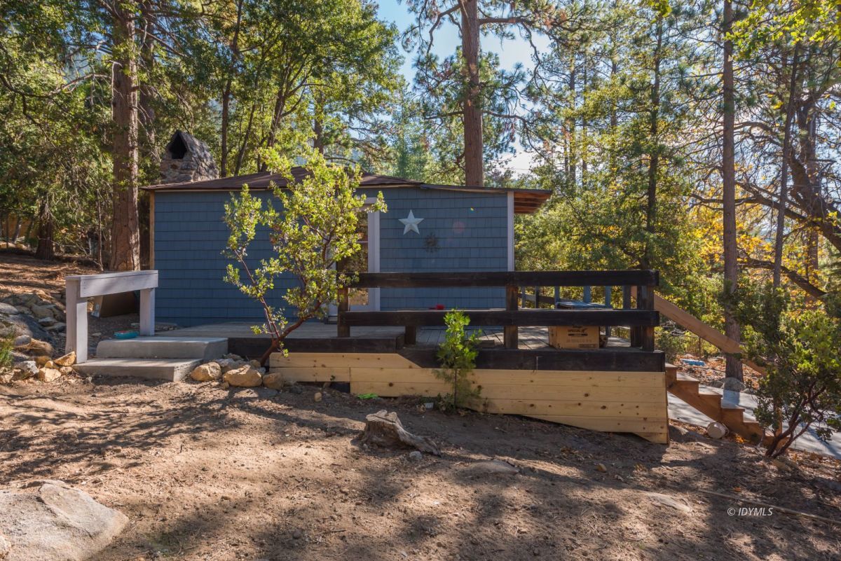 25650 Seneca Road Idyllwild, CA 92549 - Photo 19 of 23 a view of a house with a yard