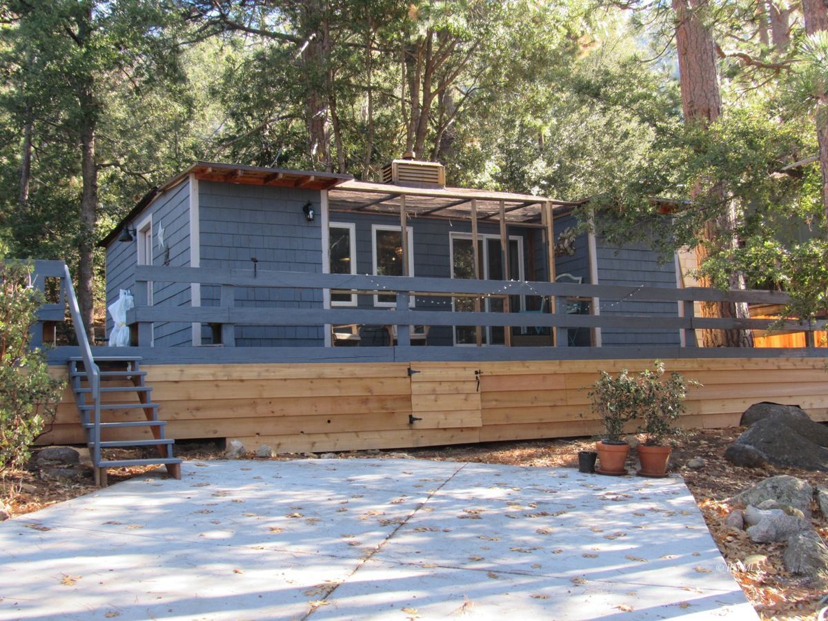 25650 Seneca Road Idyllwild, CA 92549 - Photo 2 of 23 a front view of a house with a yard