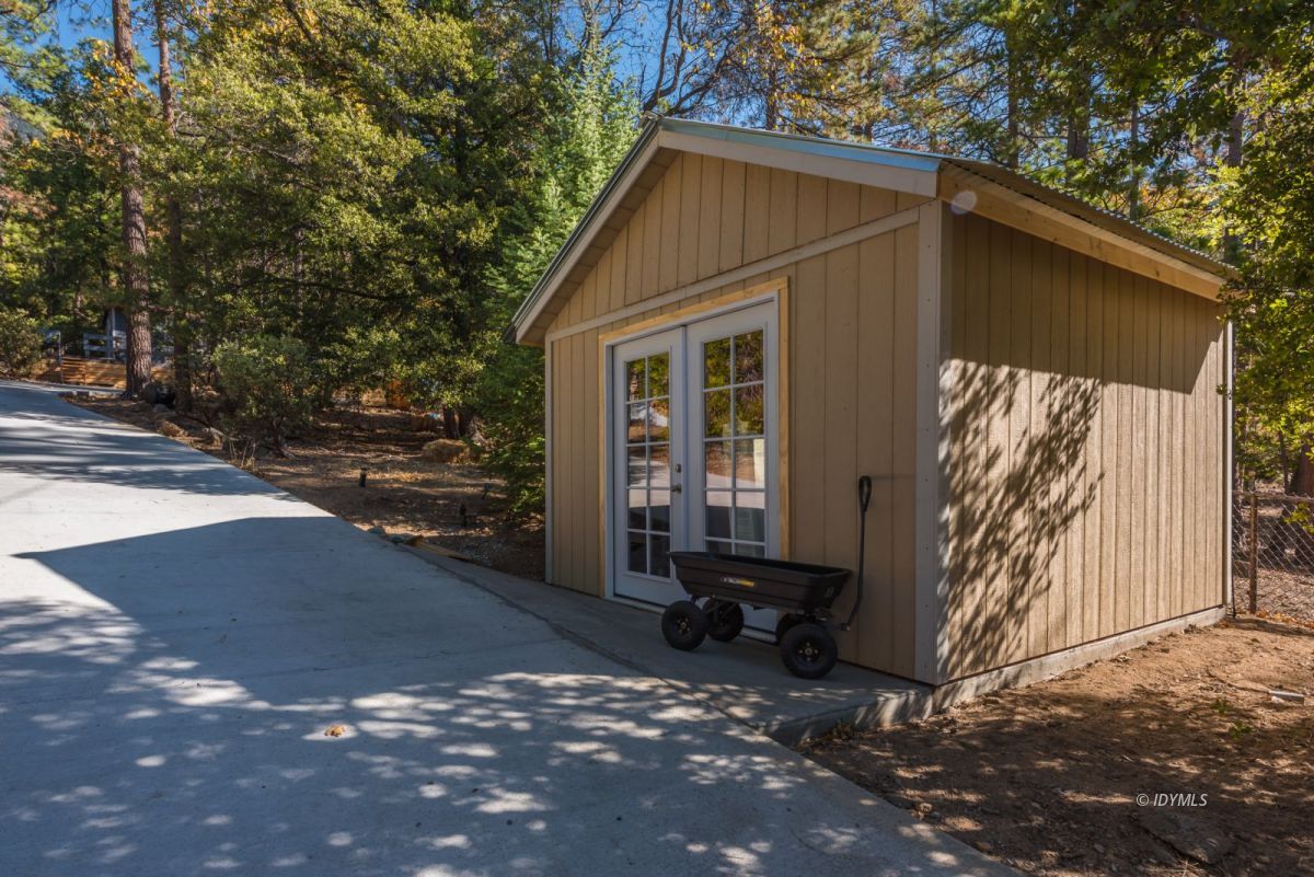 25650 Seneca Road Idyllwild, CA 92549 - Photo 21 of 23 a view of a house with a yard